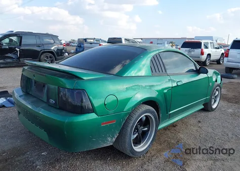 1999 Ford Mustang z USA, uszkodzony, nr VIN 1FAFP4044XF119182